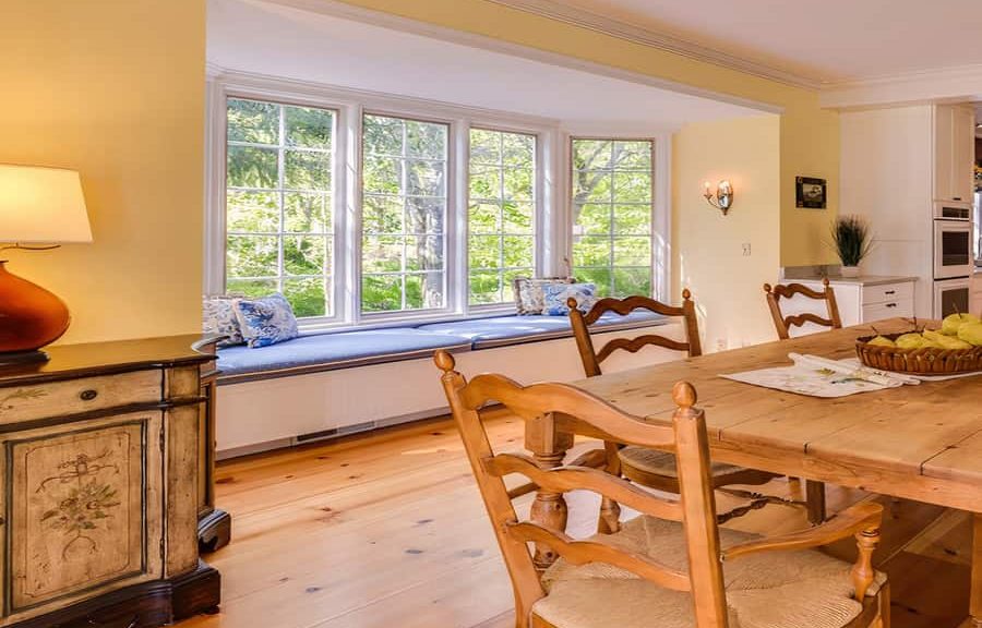 Cozy dining room with bay window.