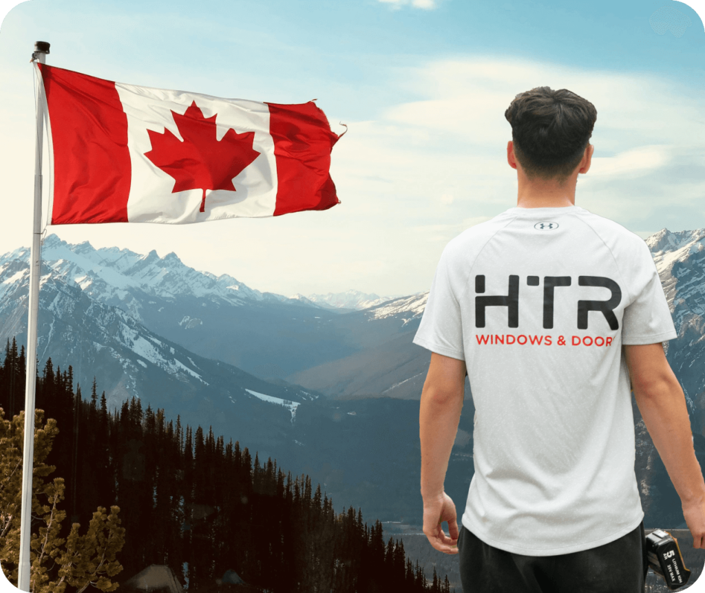 Person with Canadian flag in mountains