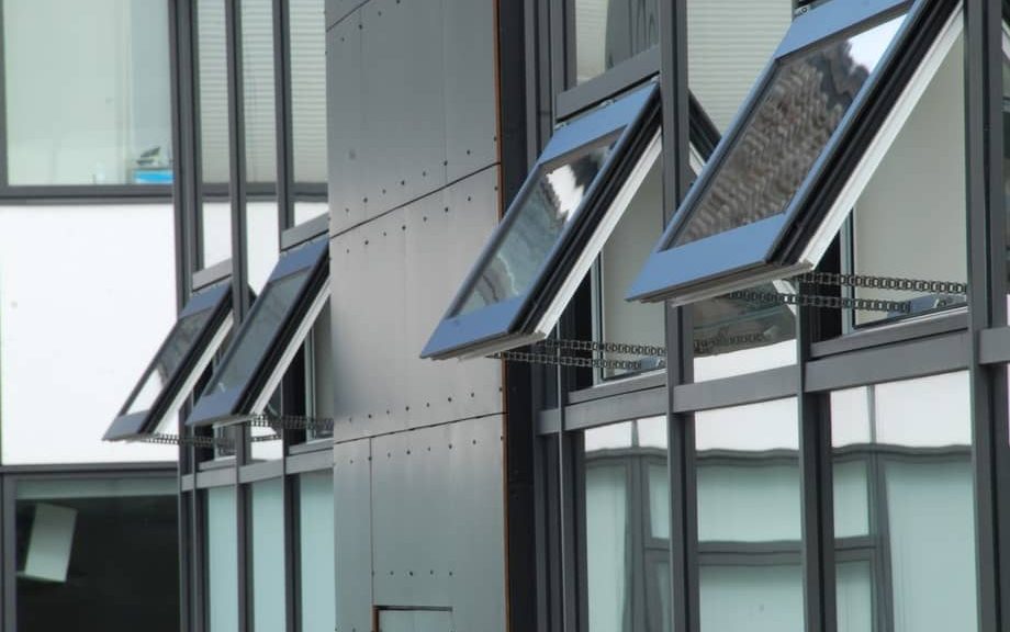 Open windows on modern building facade.